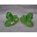 A PAIR OF VICTORIAN MOULDED GREEN GLASS LIONS, 5" high (2)
