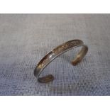 A SILVER TORQUE BANGLE marked 925 T & Co (Tiffany & Co)