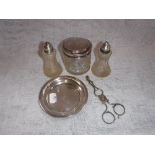 A PAIR OF GEORGIAN WHITE METAL SUGAR NIPS, a silver dish and other items