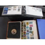 A COLLECTION OF VARIOUS FIRST DAY COVERS and a collection of stamps including Mint unused special