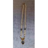 A CULTURED PEARL, HEMATITE AND DIAMOND NECKLACE with 18ct gold butterfly and clasp