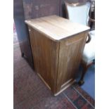 A PINE CUPBOARD with a hinged top, 30" high x 21" wide