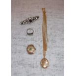 A 9CT YELLOW GOLD LOCKET, decorated with leaves, a 9ct ladies watch and a 9ct gold and silver