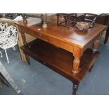 A PLANTATION STYLE HARDWOOD LOW TABLE on reeded legs, fitted two drawers and another similar , both,