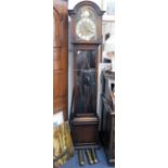 A 1930S OAK LONGCASE CLOCK with brass dial and silvered chapter ring, with chiming movement and