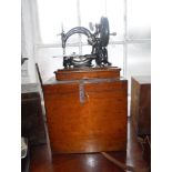 A VICTORIAN WILLCOX & GIBBS SEWING MACHING with original case