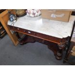A VICTORIAN MAHOGANY WASHSTAND with a shaped white marble top, 46" wide