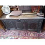 A CHARLES II OAK COFFER with a three panelled front with carved arches, 17th century and later,