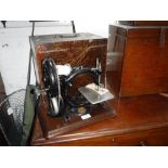 A VICTORIAN WILLCOX & GIBBS SEWING MACHINE with original case