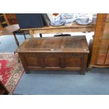 A 17TH CENTURY OAK COFFER with panelled top and front, 45.5" wide