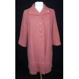 A 1950'S AMERICAN 'OINTMENT PINK' LADIES COAT with self-coloured buttons and diamante decoration,