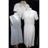 A 1920'S LIGHT SUMMER DRESS, another vintage dress in coarse linen and a 1930's quilted bed