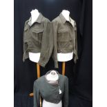 THOMAS CROWN: A SAGE GREEN SHORT JACKET, with leather strap fastening and two other short green