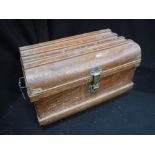 A VINTAGE TIN TRUNK