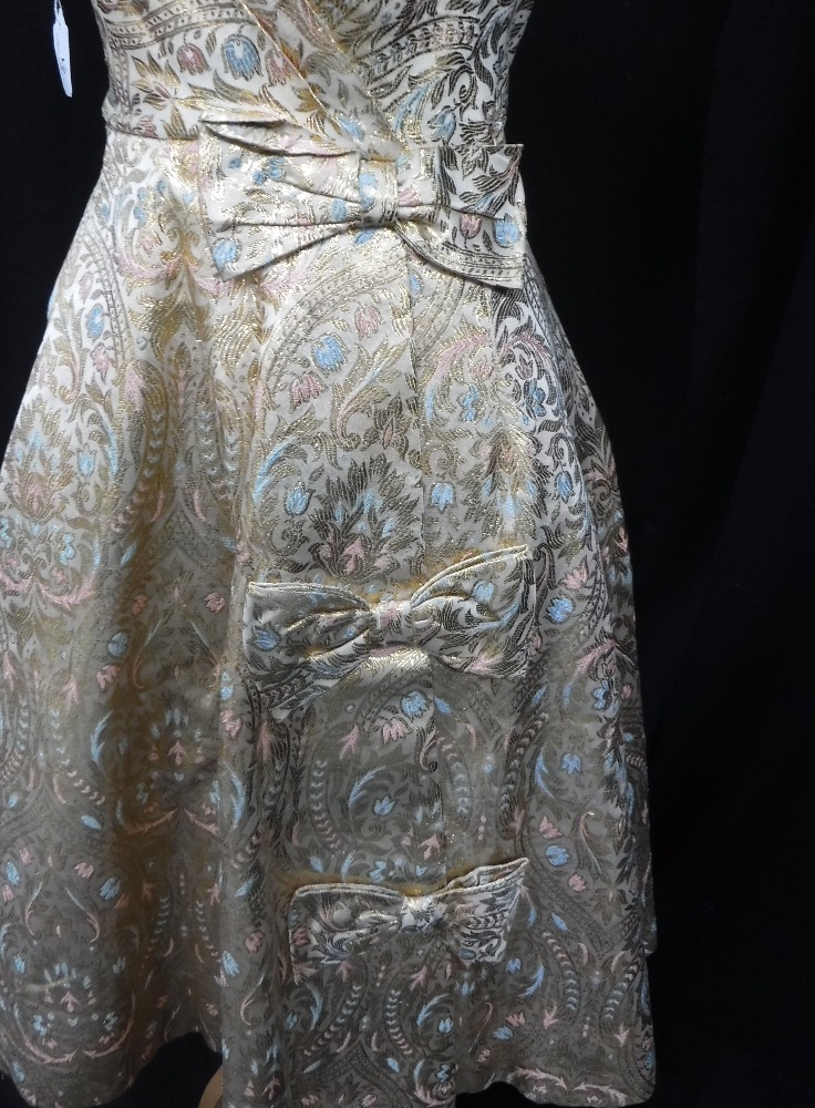 VINTAGE EVENING DRESS, circa 1950 in gold/blue and pink brocade, with bow detail to front - Image 2 of 3
