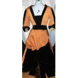 A VICTORIAN DAY COSTUME, COMPRISING A SKIRT AND BLOUSE, in chocolate brown velvet and taffeta