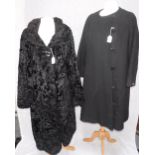 A 1960'S BLACK WOOLLEN LADIES OVERCOAT with lozenge-shape buttons and a faux astrakhan coat