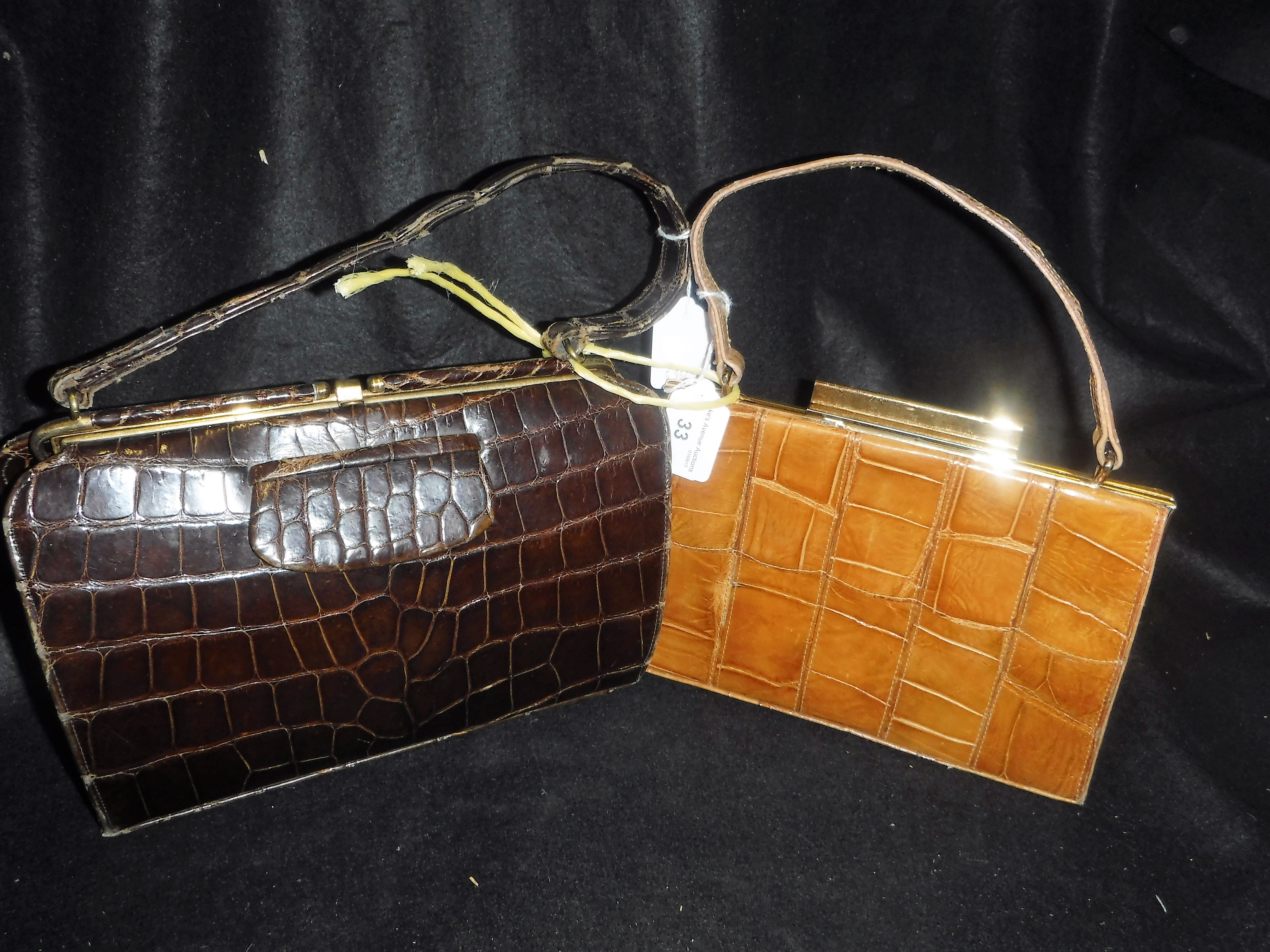 A CROCODILE SKIN VINTAGE HANDBAG and a light tan handbag from 'Mappin & Webb Ltd'