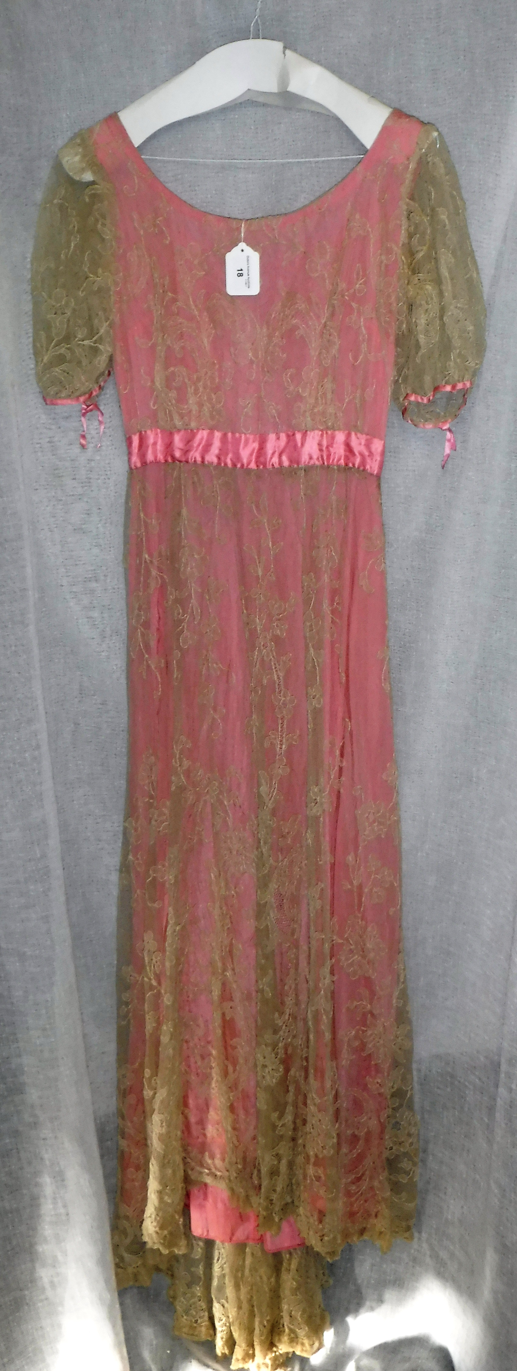 A VINTAGE EDWARDIAN STYLE NOTTINGHAM LACE DRESS, over a pink under slip