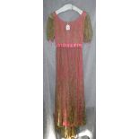 A VINTAGE EDWARDIAN STYLE NOTTINGHAM LACE DRESS, over a pink under slip