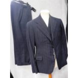 GREEN & HOLLINS: A GENTLEMAN'S VINTAGE THREE-PIECE SUIT comprising blue wool pinstripe trousers,