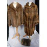 HARRISON'S OF WORCESTER & LUTON: A vintage long fur coat, circa 1950, another short fur coat and a