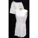 A VINTAGE LINEN TENNIS DRESS and a pair of vintage tennis shorts with racquet and balls motif