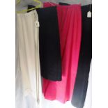 'WORTH BOUTIQUE': A BRIGHT PINK LONG EVENING SKIRT, two other long black evening skirts and a