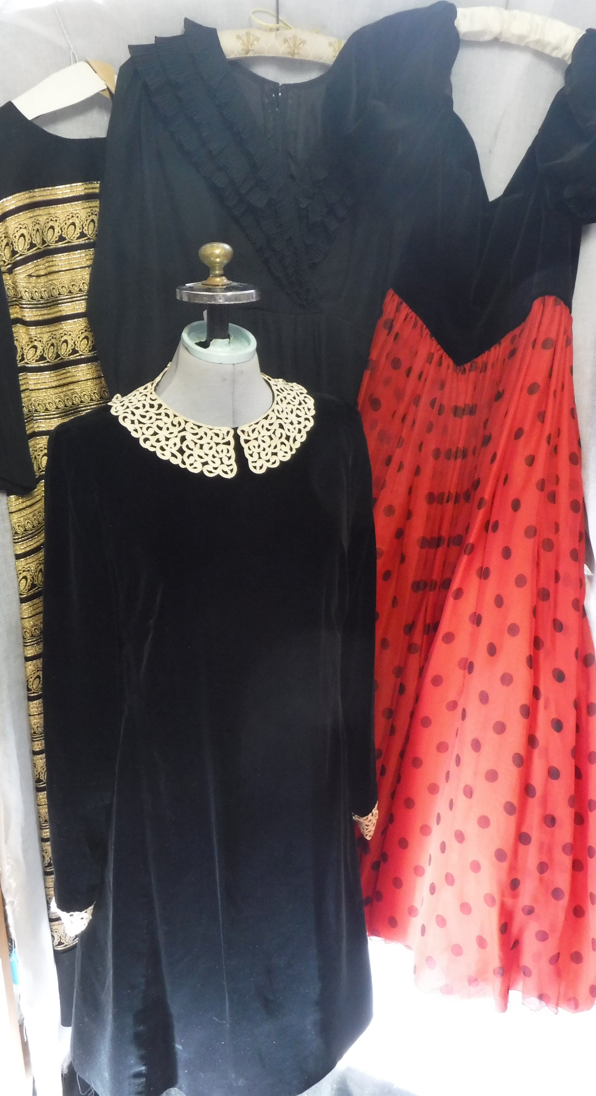 'HARDY AMIES': A VINTAGE BLACK AND GOLD BROCADE EVENING DRESS, a black velvet dress with lace collar