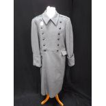 A GREY GENTLEMAN'S VINTAGE LONG WOOLLEN DOUBLE BREASTED OVERCOAT, with turned-back cuff detail