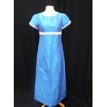 A THAI SILK BLUE EVENING DRESS, circa 1950