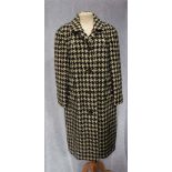 AQUASCUTUM: A HOUNDS TOOTH CHECK LADIES VINTAGE DAY COAT, with double 'faux' pockets