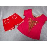 KOOKAI: A PAIR OF VINTAGE RED SHORTS and a Butler & Wilson T-shirt (2)