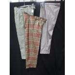 THOMAS CROWN: A PAIR OF GENTLEMAN'S WOOLLEN TROUSERS in green with mauve check, waist, 30" x