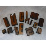 A COLLECTION OF WOODEN PRINTING BLOCKS