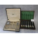 LIBERTY: A CASED SET OF SILVER TEASPOONS and a cased set of silver handled dessert knives and forks,