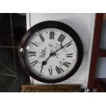 AN EARLY 20TH CENTURY DIAL WALL CLOCK