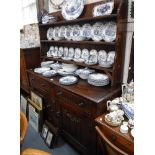 A REPRODUCTION OAK DRESSER 55" wide