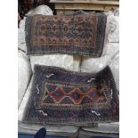 A BLUE GROUND PERSIAN BAG with flat weave back, circa 22" x 32" and a small Persian rug, 20" x 31"