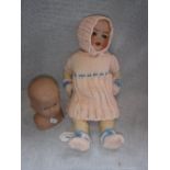 A DIAMOND POTTERY ENGLISH BISQUE HEAD DOLL and one other doll (2)