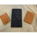 ROLLS ROYCE: A GENTLEMAN'S BLACK LEATHER DOCUMENT WALLET, a tan leather notepad holder and a tan