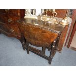 AN 18TH CENTURY OAK GATELEG TABLE of small proportions 24" high x 25" wide