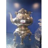 A VICTORIAN SILVER PLATED SPIRIT KETTLE ON STAND with floral scroll decoration, 16.5" high including