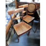 A SET OF FOUR REGENCY SOLID SEAT DINING CHAIRS