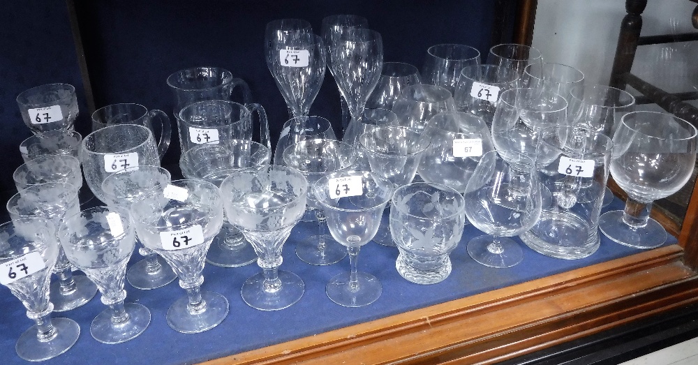 A COLLECTION OF GLASSES WITH VINE LEAF ETCHED DECORATION and similar drinking glasses