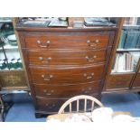 A TALL BOWFRONTED MAHOGANY CHEST OF DRAWERS 50" high x 36" wide