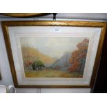 A 20TH CENTURY WATERCOLOUR of an autumnal landscape, monogrammed 'TE' and dated 1929, in gilt oak