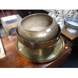 A LARGE BRASS JARDINIERE, a hanging copper jardiniere and a brass tray (3)