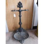 A VICTORIAN STYLE CAST-IRON UMBRELLA STAND, with shell-form base