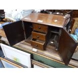 A 19TH CENTURY WALNUT TABLE CABINET, fitted two doors 13.5" wide